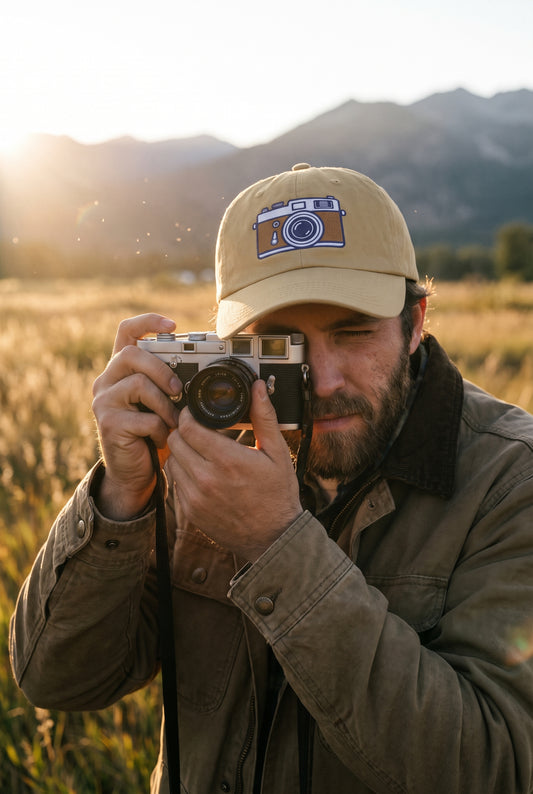 Film Camera dad cap worn by a photographer, lifestyle