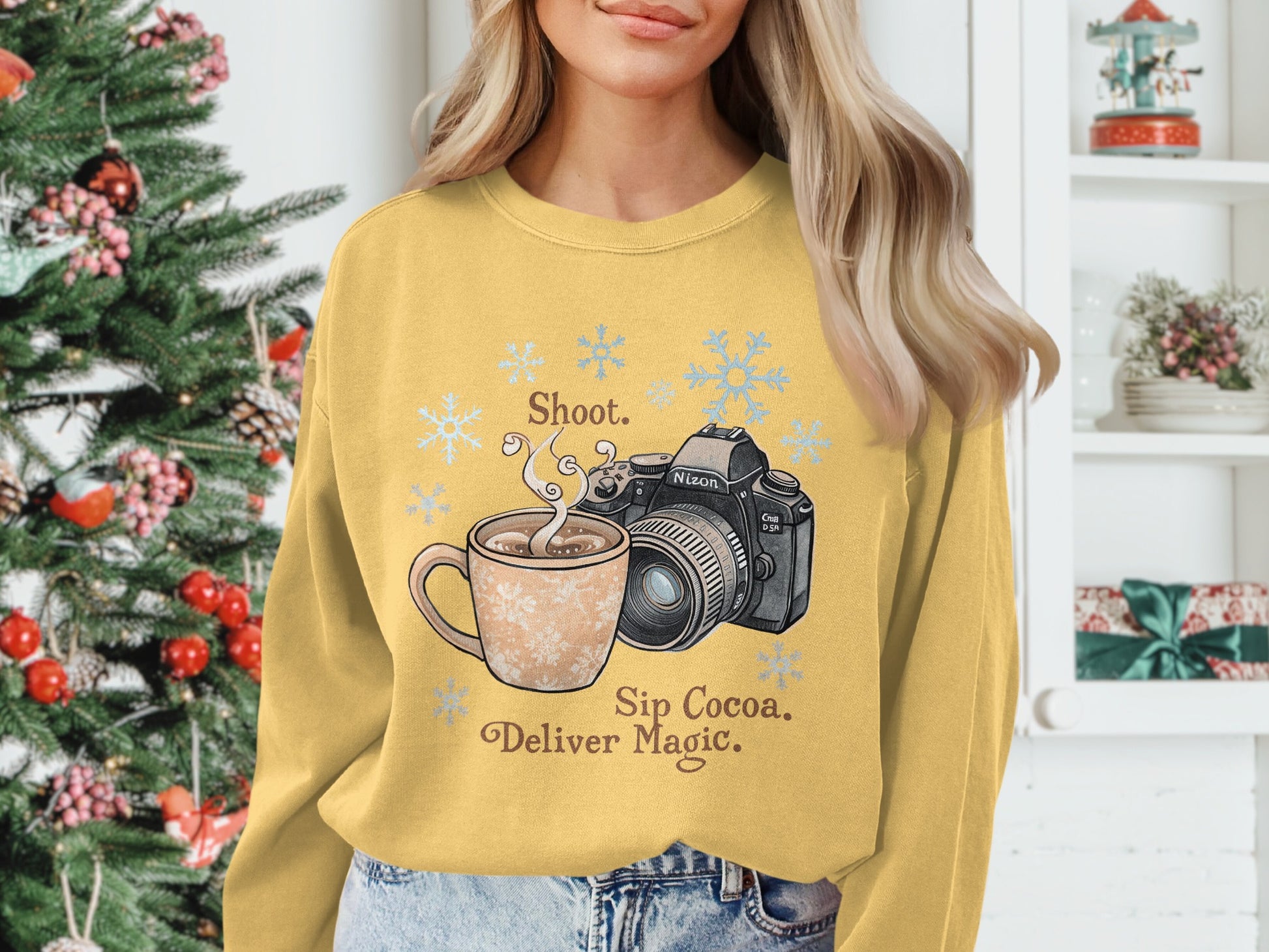 Shoot Sip Cocoa Deliver Magic design crewneck