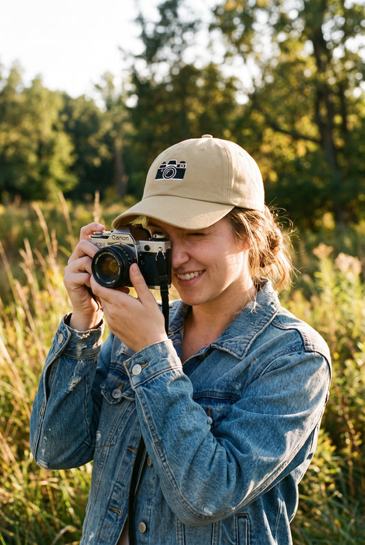 Vintage Camera dad cap worn by a photographer, lifestyle